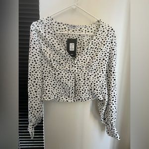 Polka dot crop top from Fashion Nova size small. Never been worn.